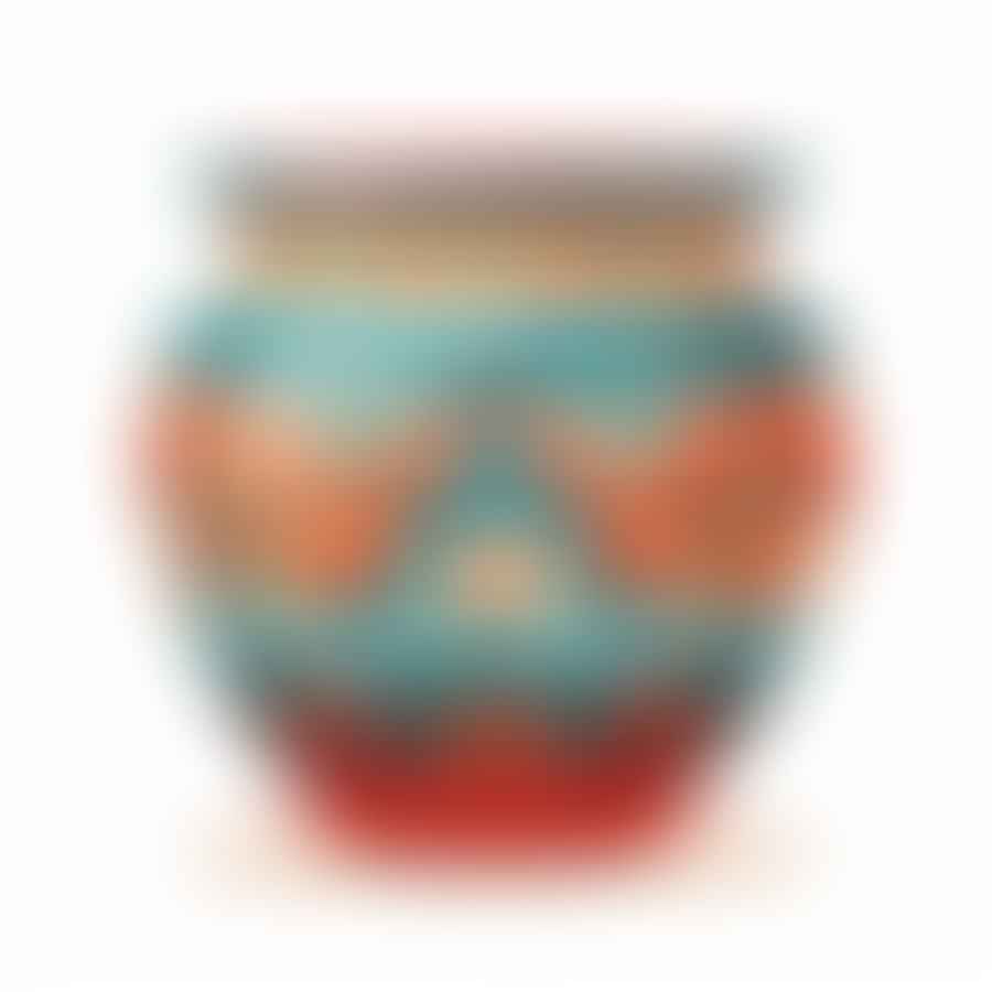 Decorated clay pot with vibrant colors and patterns